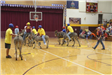 People riding donkeys during the donkey ball game